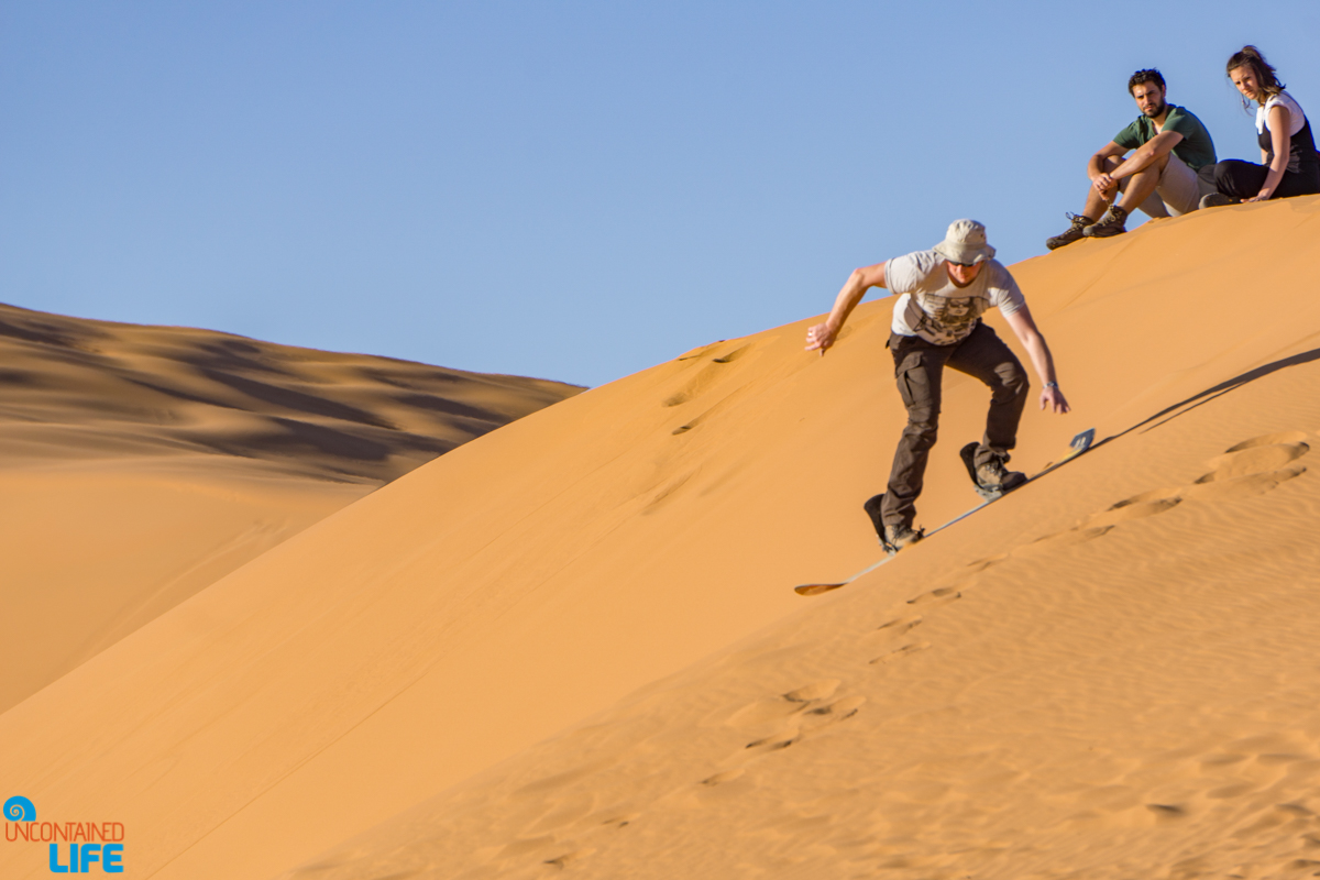 Sand boarding, Visiting the Sahara Desert in Morocco, Uncontained Life